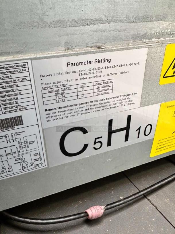 Omcan RS-CN-0250 refrigerated merchandiser; excellent condition. Parameter setting label visible; 110V. Fully tested.