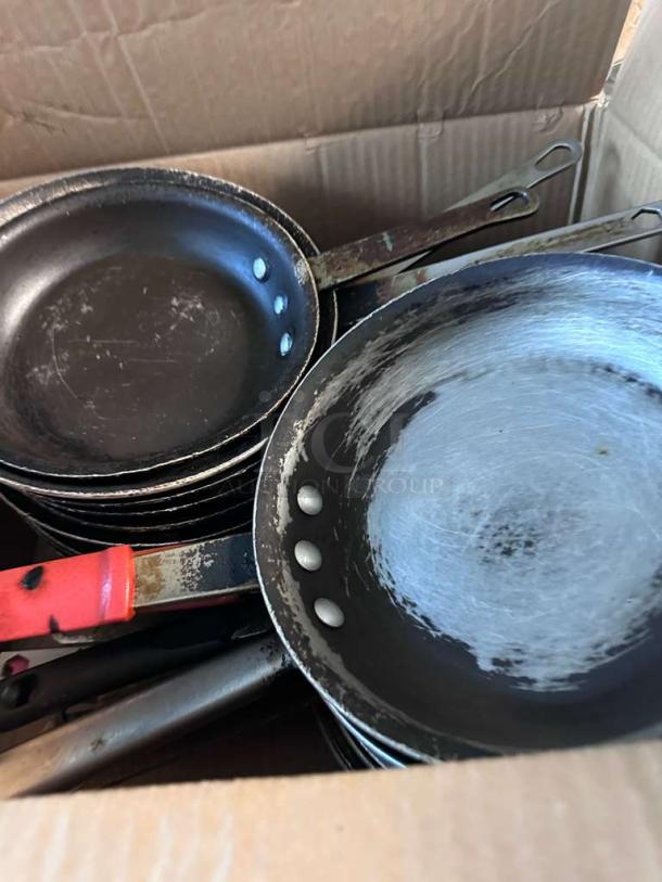 Lot of 22 commercial frying pans, outstanding condition, inspected, ready for use, visible handles, and slight wear.