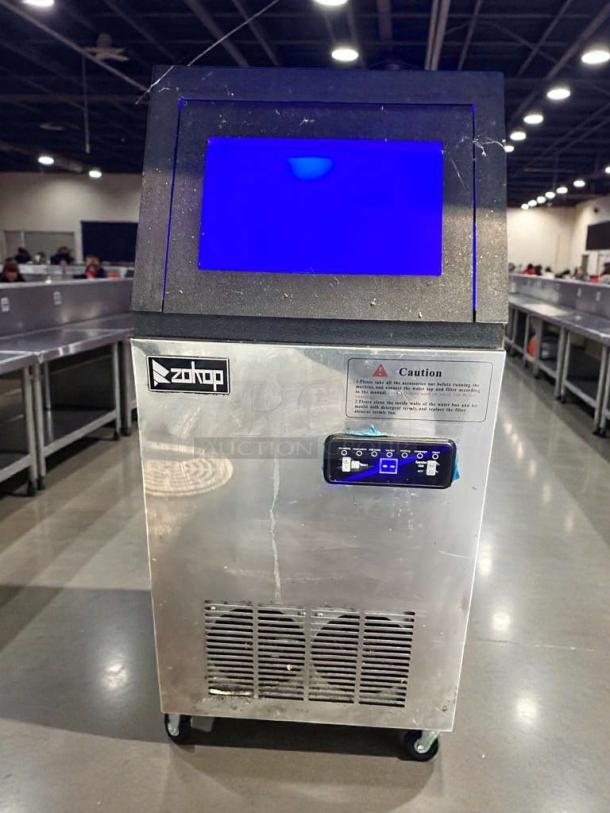 Zotop BKF-B40F-C-55R undercounter ice maker, outstanding condition, 120V, fully tested, caution label visible.