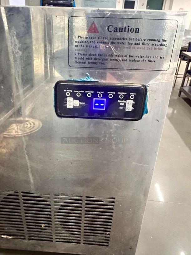 Zotop BKF-B40F-C-55R ice maker, outstanding condition, stainless steel, 120V, tested, control panel visible, caution label attached.