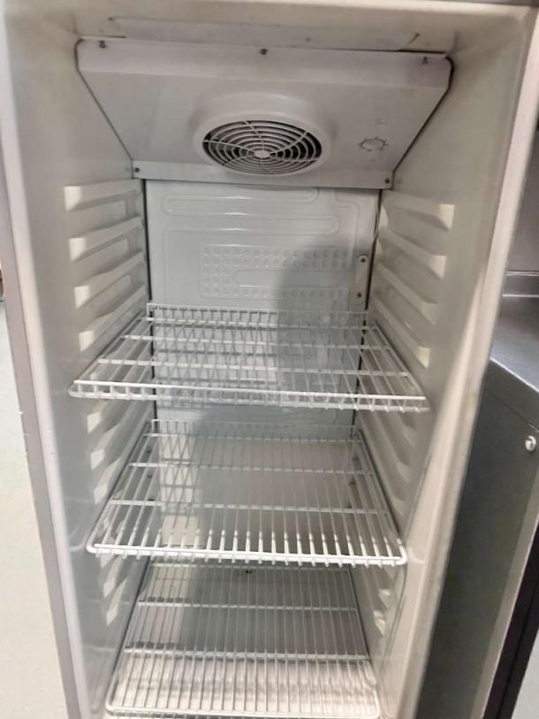 Premium Levella PRF90DX commercial glass door refrigerator, pristine condition, features multiple wire shelves, fully tested, 115V.
