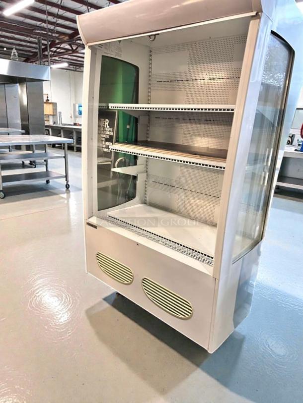 Beverage-Air MB13US open-air fridge in outstanding condition, 115V, fully tested, with transparent sides and shelving.