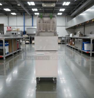 Frymaster FES35T0ZN0ZZNG gas floor fryer in pristine condition, natural gas compatible, with dual fryer baskets.
