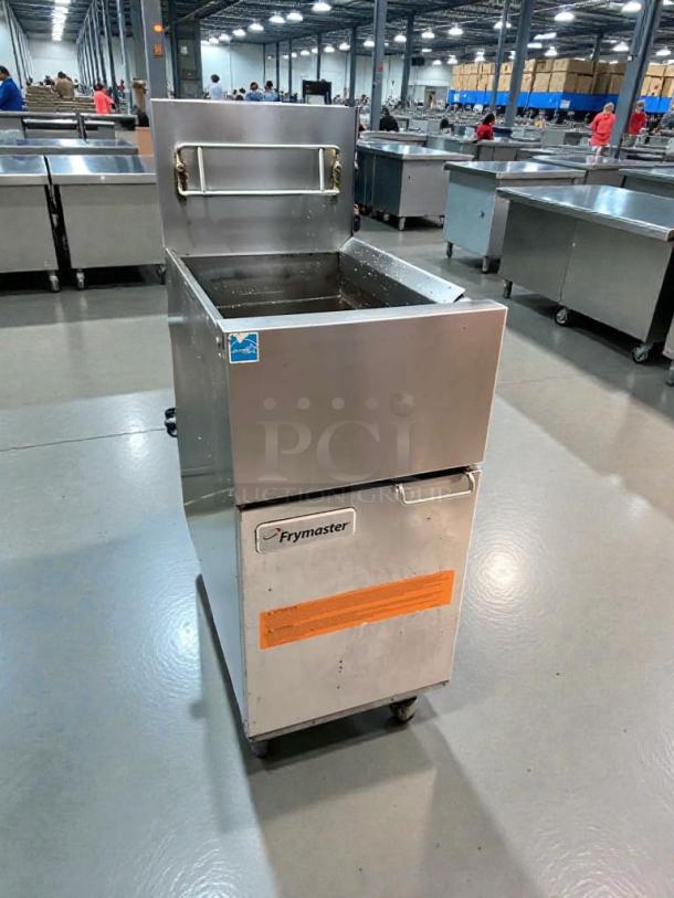 Pristine Frymaster FES35T0ZN0ZZNG gas floor fryer in a commercial setting; natural gas, tested & working.