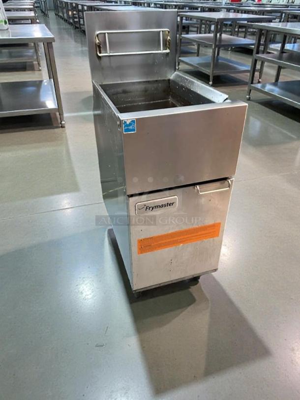 Pristine Frymaster FES35T0ZN0ZZNG gas floor fryer. Natural gas, fully tested, excellent condition with visible branding.