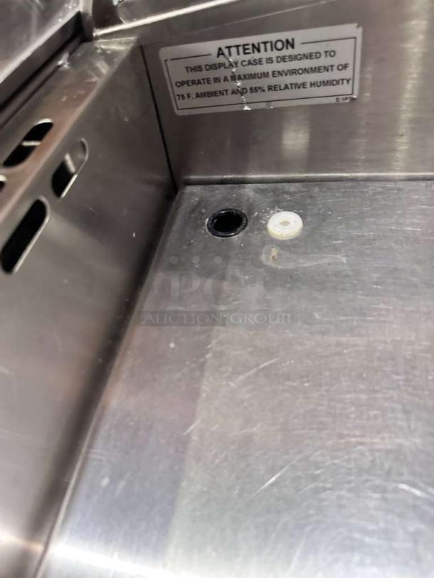 Federal Industries SQ3CDSS refrigerated prep table in pristine condition. Label indicates optimal operation at 75°F, 55% humidity.