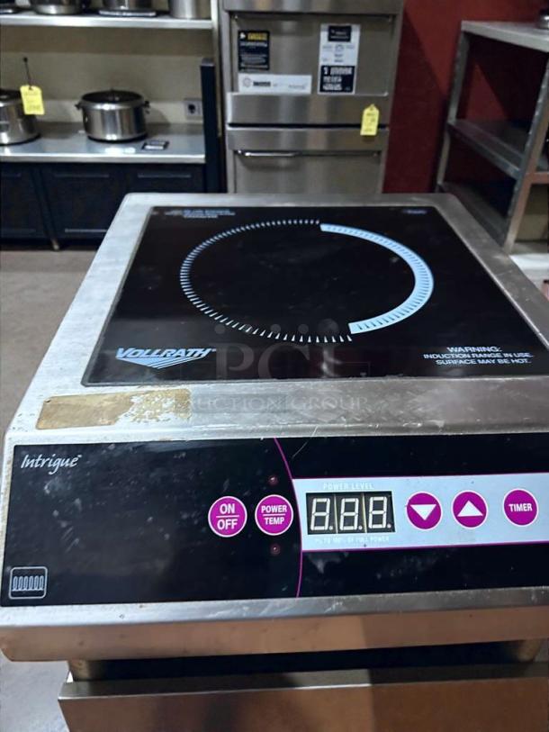 Vollrath 69503 countertop induction range in pristine condition with digital controls, power settings, and timer, 208/240V.