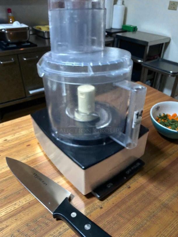 Cuisinart 14-cup food processor in outstanding condition, 120V, fully tested and working, shown on a wooden countertop.