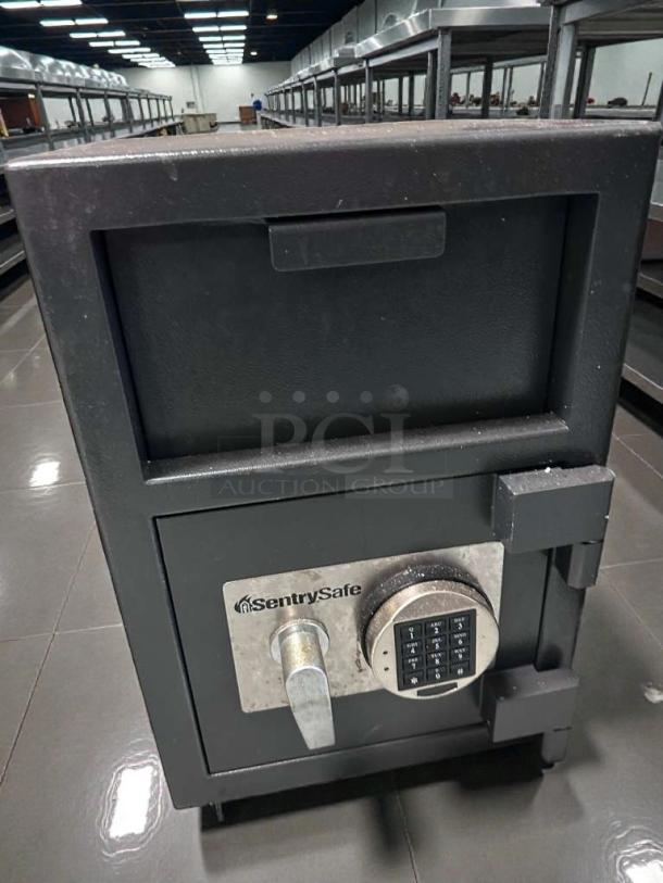 SentrySafe drop deposit safe, electronic keypad, very good condition, fully tested and working, secure storage solution.