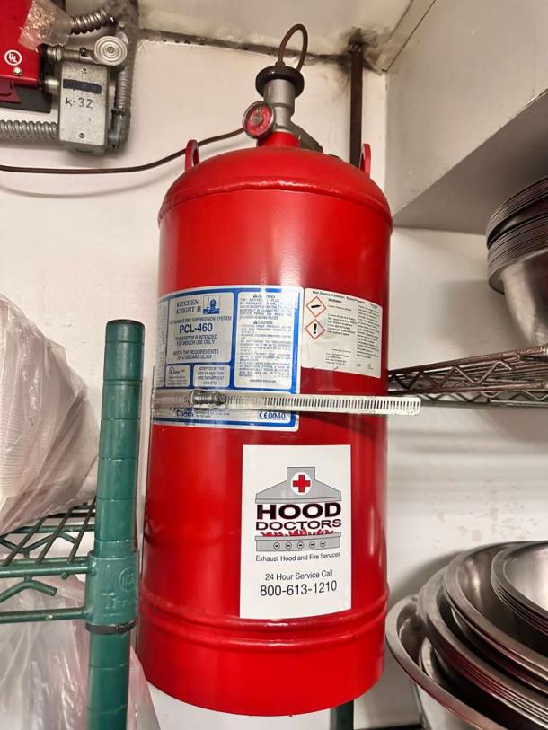 Kitchen Knight II PCL-460 fire suppression system, red, very good condition, fully tested by Pyro-Chem, with service label.