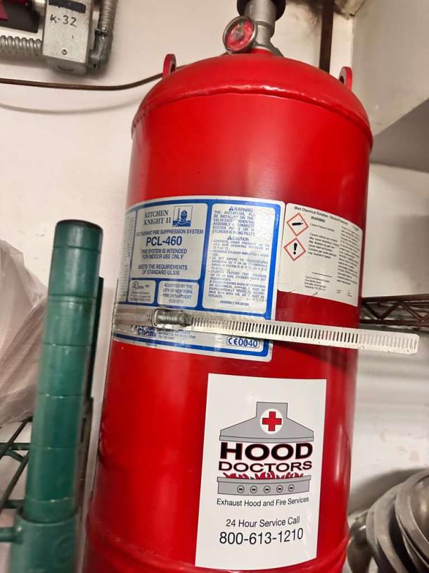 Kitchen Knight II PCL-460 fire suppression system, red, very good condition, fully tested, includes service label.