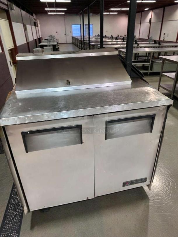 True TSSU-36-08 refrigerated prep table, stainless steel, dual doors, very good condition, 115v, fully tested.