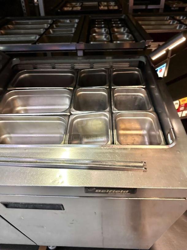 Delfield TSSU-36-08 refrigerated prep table, very good condition, stainless steel, 115V, commercial use, tested & working.