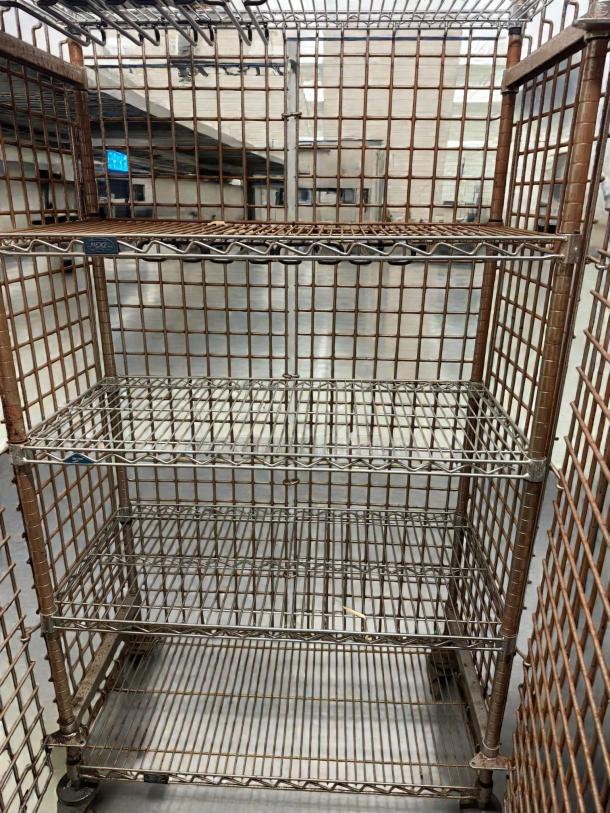 Metro NSF 36" mobile chrome wire security cage kit, great condition, heavy-duty, with multi-tier shelving, on wheels.