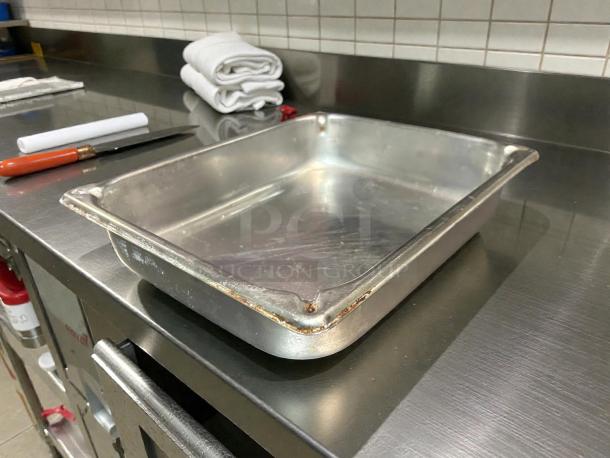 Vollrath 30222 Super Pan V® half-size steam pan in stainless steel, showing wear on edges, ideal for commercial kitchens.