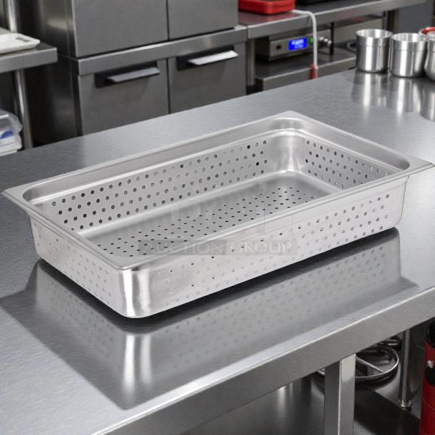 Carlisle DuraPan™ stainless steel perforated steam table pan, full-size, 4" deep, in perfect condition, on metal surface.