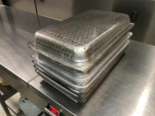 Full-size Carlisle DuraPan™ perforated steam table pan, 4" deep, stainless steel, stack of pans, excellent condition.