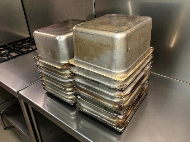 Stack of Thunder Group STPA3126 1/2 size 24 gauge stainless steel steam pans, 6" deep, in excellent condition.