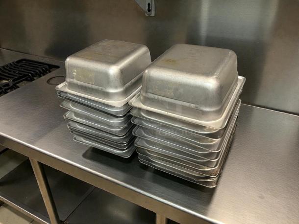 Carlisle 607162 DuraPan 1/6 Size 2.5" Deep Anti-Jam Stainless Steel Pans, outstanding condition, 24 gauge, stacked.