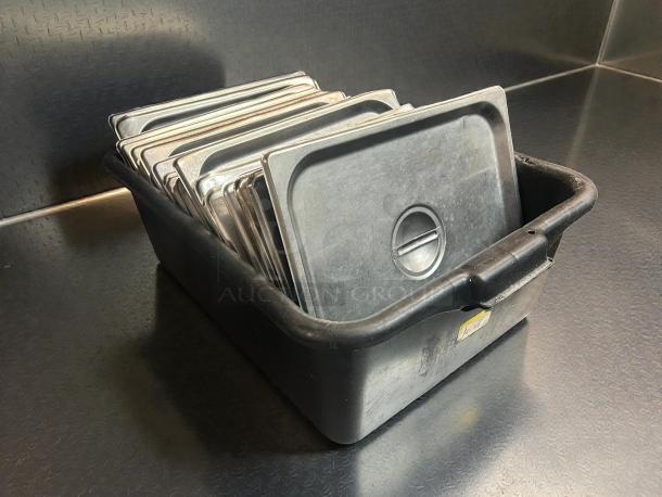 Choice 1/2 Size Stainless Steel Hotel Pan Covers in bin, perfect condition, durable with finger handle design.