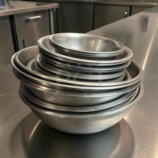 Stack of Choice stainless steel mixing bowls in superb condition, ranging from 9.5" to 16.5" diameter.