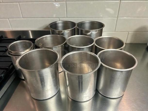 Vollrath stainless steel Bain Marie pots, various sizes (5”-7.5” diameter), in good condition, set of eight.