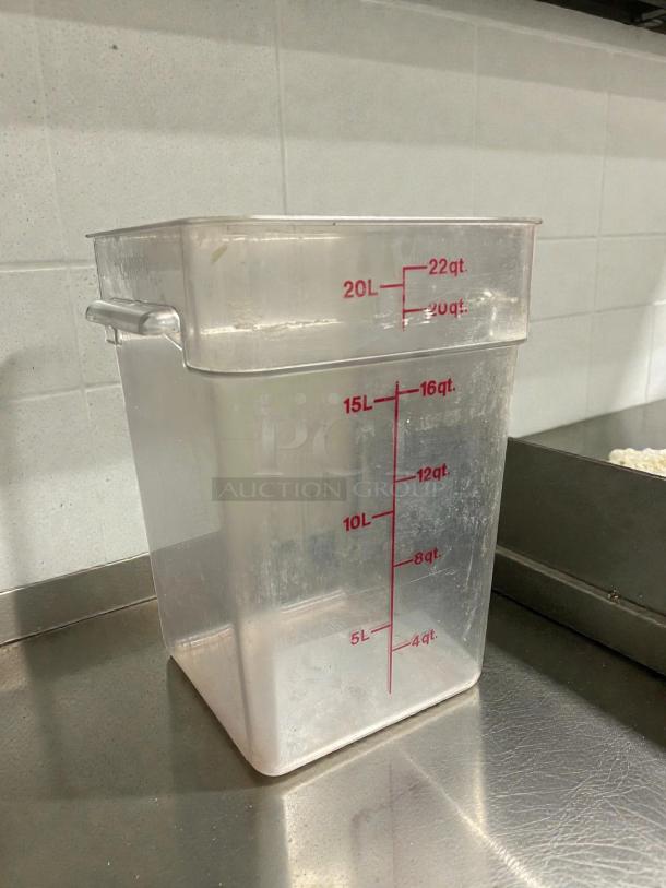 Cambro 22SFSCW441 22 qt square food storage container, clear polycarbonate, allergen-free, with red measurement markings.