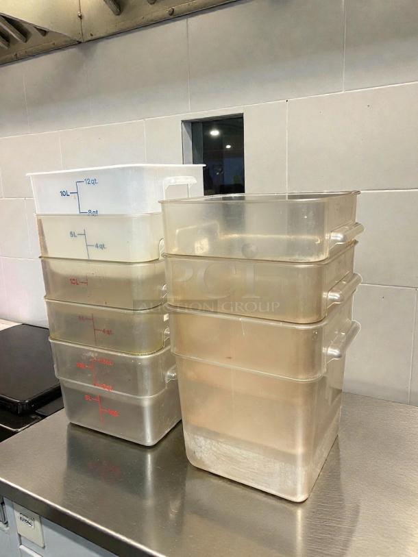 Clear Cambro® square food storage containers, 12QT and 18QT. Stacked, marked with quart/liter measurements, in great condition.