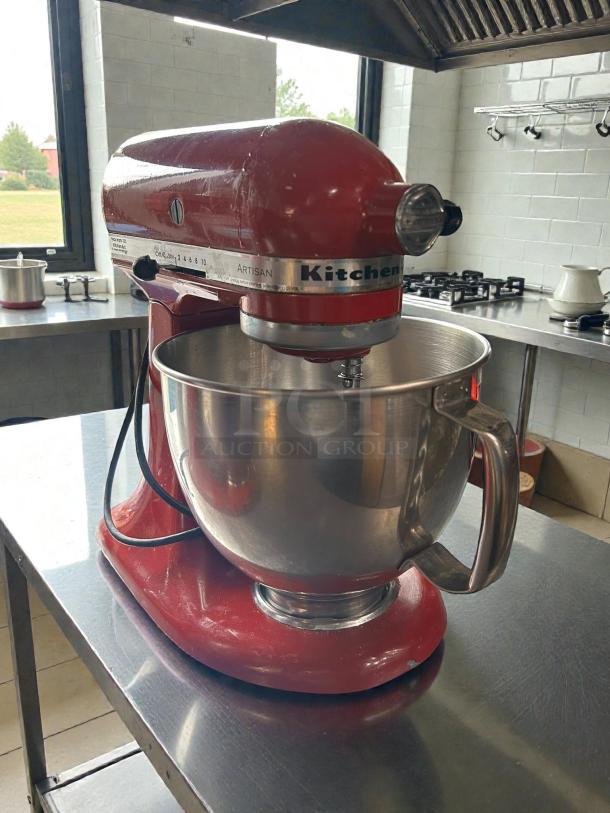 KitchenAid Artisan Stand Mixer, 5-qt in red. Immaculate condition, tested and working. Visible logo and model label.