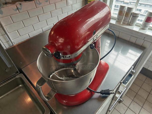 KitchenAid Artisan Stand Mixer, 5-qt, red, in immaculate condition. Tested, working, includes stainless steel bowl.