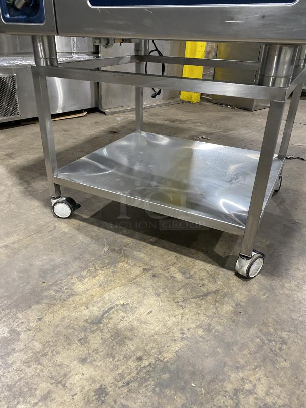 Alto-Shaam CTP720G convection oven on stainless steel stand, natural gas powered, model SN: 2377554-000, on wheels.