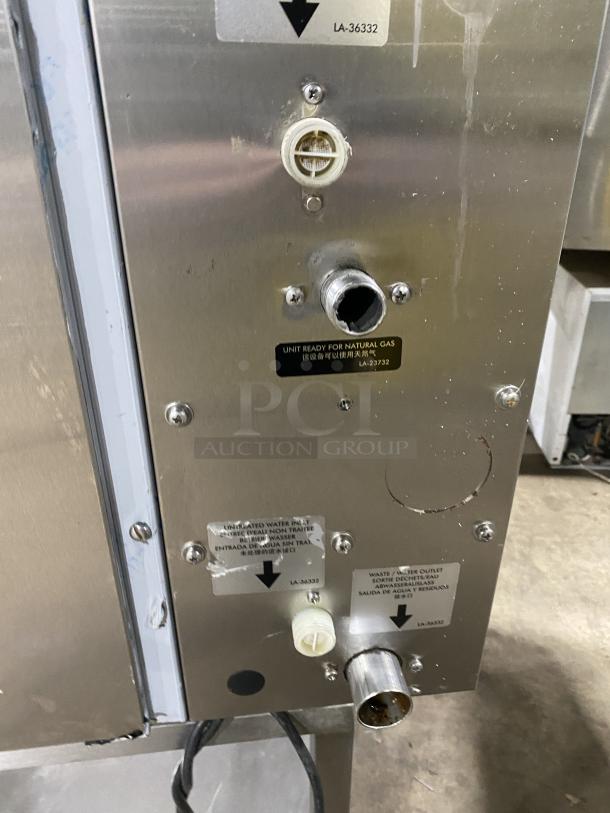 Alto-Shaam CTP720G stainless steel convection oven, natural gas, with equipment stand, model number visible.