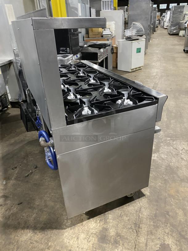 U.S. Range Performer Series 10 burner gas range with double oven, stainless steel, Model PS-10-2626RC, on casters.