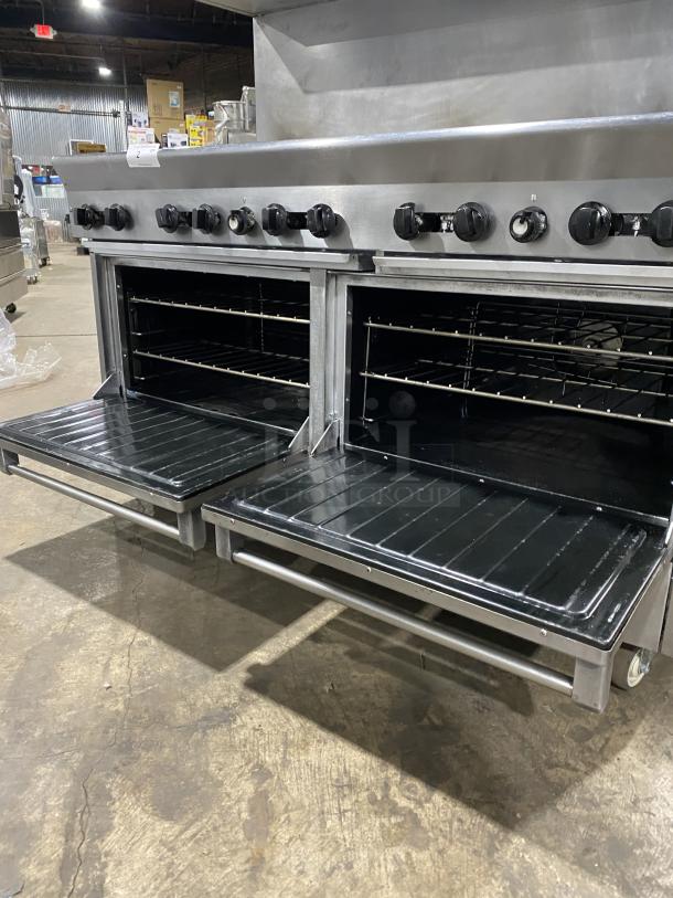 U.S. Range Performer Series 10-burner stainless steel range with double oven, backsplash, and overhead shelf. Model PS102626RC, on casters.