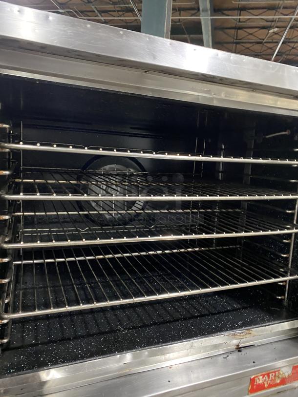Blodgett Mark-V Series double convection oven, stainless steel, wired racks, solid state thermostat, excellent condition.