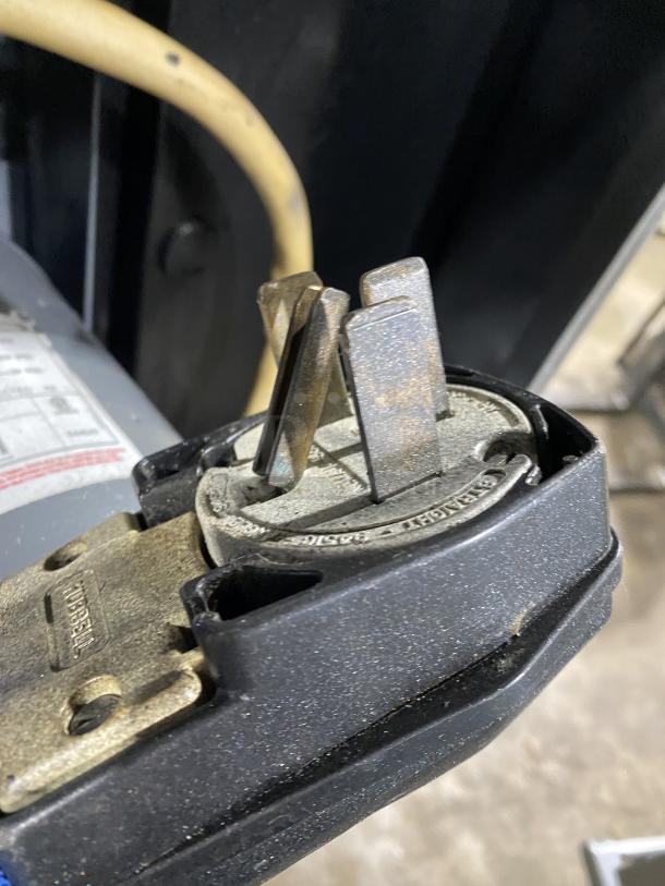 Close-up of a power plug connected to the Blodgett Mark-V Series convection oven, highlighting its condition and electrical setup.