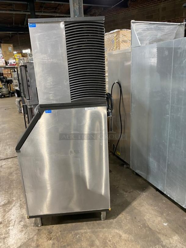 Manitowoc stainless steel ice maker, model IR0850A-261, air-cooled, electric, on legs, in used condition.
