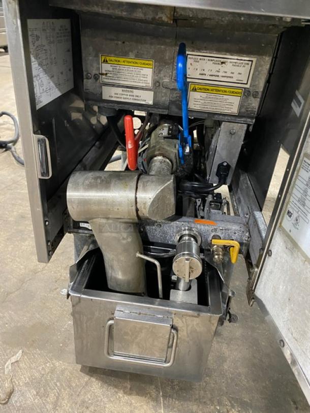 Pitco SFSE14S electric fryer with filtration system, stainless steel, on casters, includes basket hanger and back splash.