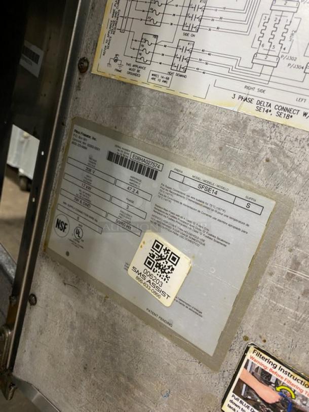 Pitco SFSE14-S stainless steel fryer label showing model, serial number E08HA027574, and electrical specifications, 208V 3 phase.