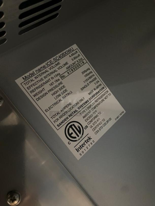 Vendo Lumilinna Series Black Slush Refrigerator, Model: ICE-SC40BXIWU, SN: A19300018, 115V, new with minor scratches.