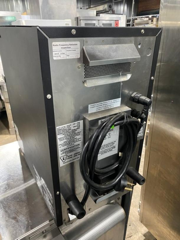 MerryChef Eikon E2S high-speed cook oven, black, electric, countertop model, 208/240V, showing power cord and certification labels.
