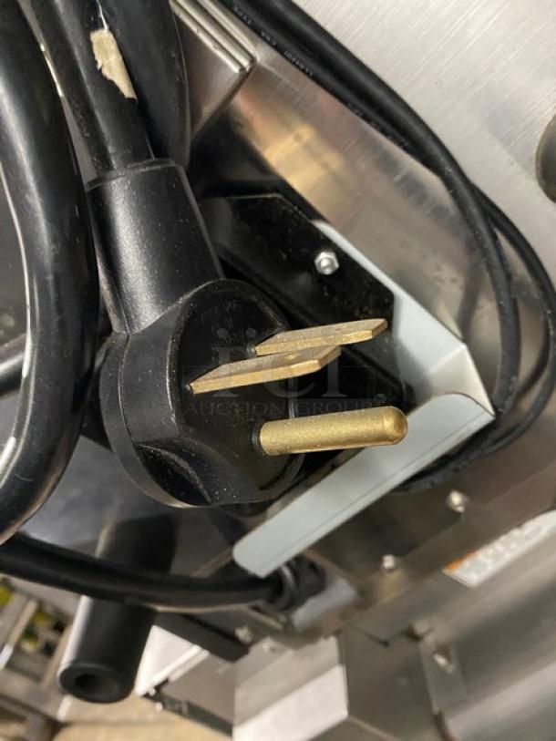 MerryChef Eikon E2S commercial high-speed rapid cook oven, black, electric, 208/240V, shown with power plug.