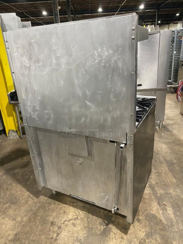 Vulcan commercial stainless steel 6-burner gas range/oven combo with backsplash, overhead salamander shelf, and wired oven rack.