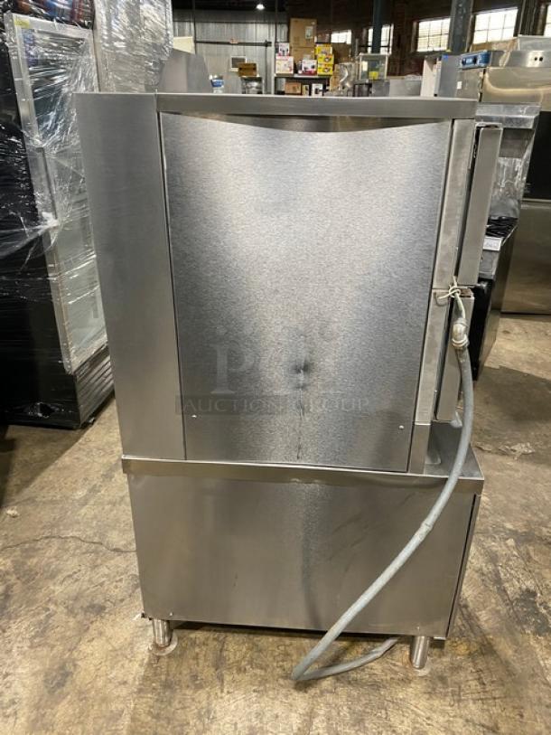 Vulcan VSX24G stainless steel dual compartment convection steamer, natural gas, with pan racks and individual controls, on legs.