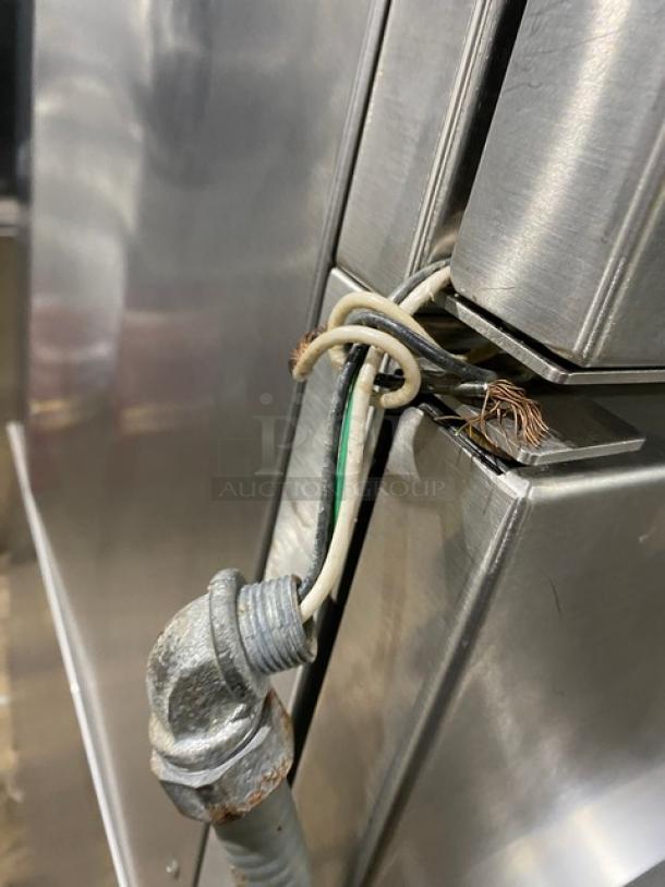 Vulcan VSX24G commercial stainless steel convection steamer with natural gas power, dual compartments, and built-in pan racks.