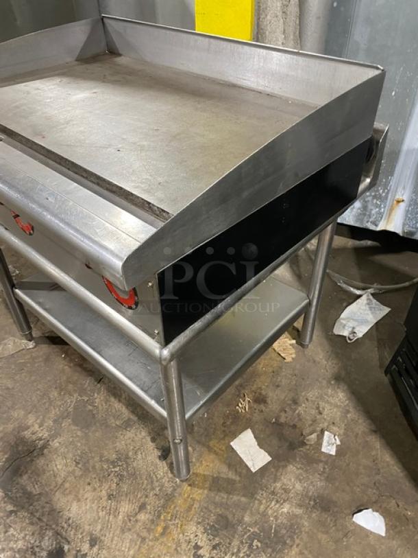 Star Max Series 36" stainless steel electric griddle with back and side splash, on legs with single undershelf stand.