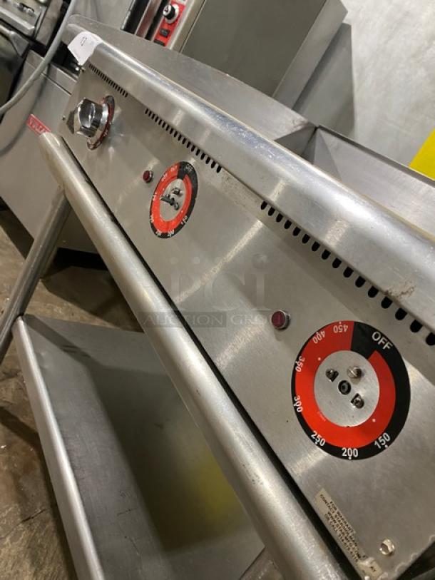 Star Max Series stainless steel 36" electric griddle, with back and side splash, mounted on undershelf stand.