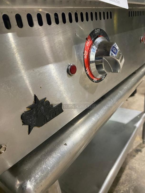 Star Max Series 36" Stainless Steel Electric Griddle with temperature dial, back and side splash, and undershelf stand.