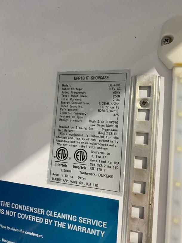 Dukers LG-430F commercial refrigerator label showing model, voltage, power input, and energy specs.