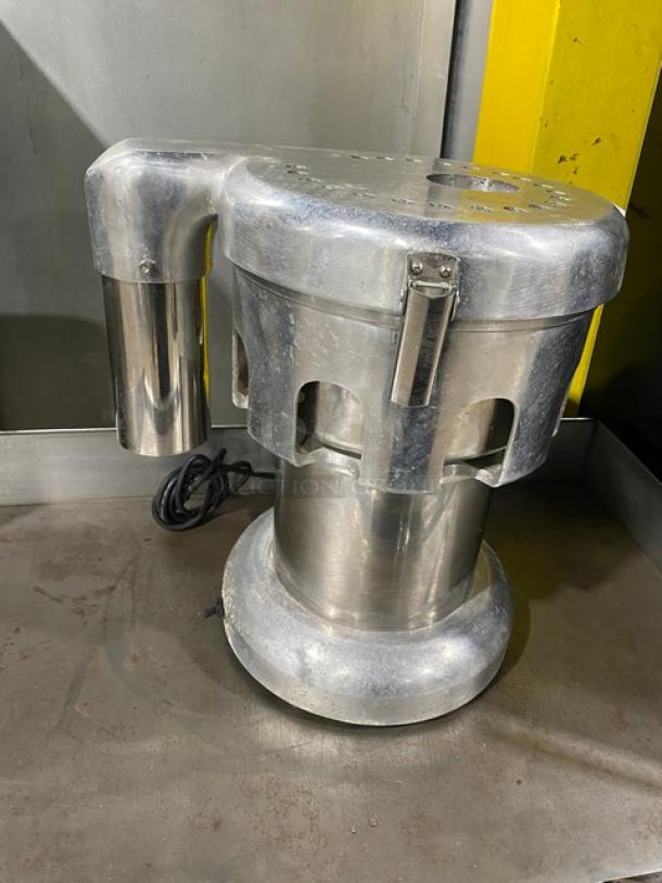 L&J Stainless Steel Electric Juice Extractor, Model WF-A2000, 110V. Features durable countertop design, used condition.